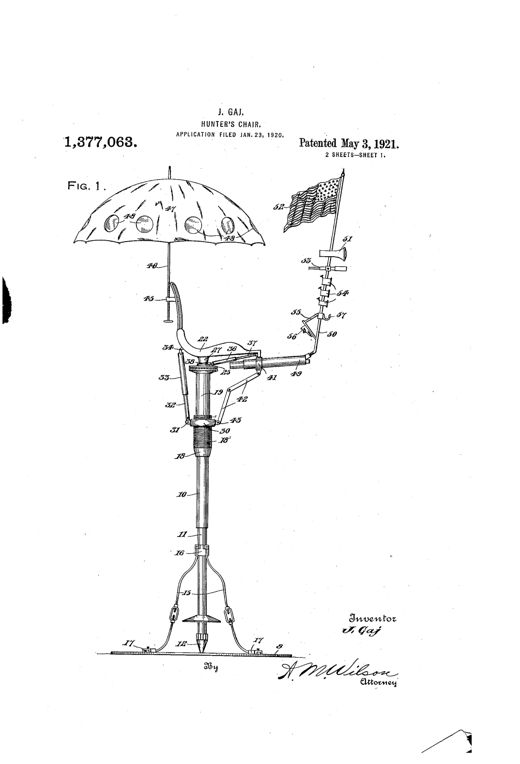 Patent drawing of a tall telescoping metal standard topped by a tilting hollow seat beneath an umbrella with round transparent windows, with a forward bracket bearing a lamp, flag, sight glass, and horns, and the base spiked into the ground with turnbuckle braces.